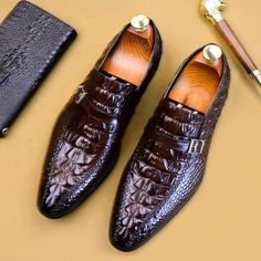 Elevate your style with our exquisite Luxury CrocLeather Buckle Strap Oxford Dress Shoes, crafted with the finest genuine cow leather for a touch of luxury. Not only do these shoes exude sophistication with their solid pattern and pointed toe shape, but they also prioritize comfort with their soft cow leather lining and cushioned full grain leather insole. Perfect for any occasion, these brogue shoes offer a secure and adjustable fit with their buckle strap closure and guarantee durability and traction with their rubber outsole. Don't miss out on the opportunity to make a statement with these versatile and timeless shoes. Order now and experience the perfect blend of style and comfort. Elegant Semi-formal Dress Shoes With Crocodile Pattern, Brown Leather Shoes With Crocodile Pattern And Pointed Toe, Leather Shoes With Crocodile Pattern And Round Toe, Formal Faux Leather Shoes With Round Toe, Business Slip-on Faux Leather Shoes, Brown Crocodile Pattern Pointed Toe Dress Shoes, Leather Oxfords With Crocodile Pattern And Pointed Toe, Brown Faux Leather Oxfords For Formal Occasions, Elegant Brown Monk Strap Shoes For Office