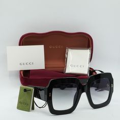 Introducing the stylish and luxurious Gucci GG1111S 001 Black/Grey Gradient sunglasses, exclusively available at OSSA FRAMES.  With its sleek black acetate frame and chic grey gradient lenses, these sunglasses are the epitome of elegance and sophistication. The square shape is perfect for women who want to make a bold fashion statement while still exuding a sense of classic charm. The Gucci GG1111S sunglasses feature a lens socket width of 53 and a temple length of 145, providing a comfortable fit for all-day wear. The bridge size of 25 ensures a secure and stable fit on the face, while the acetate frame material adds durability and a touch of luxury. Whether you're lounging by the pool, strolling through the city streets, or attending a glamorous event, these sunglasses are the perfect ac Trendy Formal Sunglasses With Gradient Lenses, Trendy Acetate Sunglasses With Gradient Lenses, Designer Acetate Sunglasses With Uva Protection, Black Acetate Sunglasses With Uv Protection, Luxury Acetate Sunglasses With Tinted Lenses, Luxury Tinted Lenses Sunglasses In Acetate, Modern Gucci Acetate Sunglasses, Gucci Luxury Square Frame Sunglasses, Modern Gucci Sunglasses In Acetate