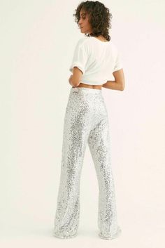 Free People Festival Sequin Pants-L-$248 MSRP Available for purchase new w/o price tag is a Factory Outlet (see description below for history; has black line going thru cloth label name) Free People Pants -  Festival Sequin Pants -  Size Large; measures approx. 36" waist, 46" hips, 50" length, 35" inseam, 13" rise -  The sparkle and flare your closet has always needed, these sequin embellished pants are featured in the perfect high-waisted silhouette. Elastic waistband at top hidden side zip clo Cloth Label, Label Name, Sequin Pant, Sequin Pants, Black Line, Velvet Pants, Floral Pants, Distressed Black Jeans, Free People Pants