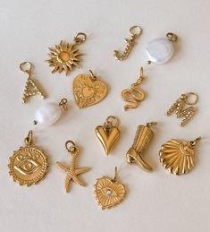 Mix and Match Gold and Pearl Charms 18K Gold Plated Stainless Steel Freshwater Pearls Charm Length: approx. 0.5 - 0.9 inches Sun Charm, Charm Collection, Cowgirl Boot, Gold Sun, Gold Charms, Jewelry Charms, Gold Snake, Gold Initial, Chain Anklet