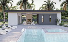 a house with a pool and lounge chairs next to it