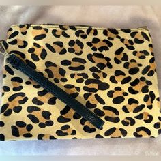 Never Used. Zipper Pouch Wristlet. Cow Hair Animal Print/Black Leather. Fashion Accessory Pouch Clutch With Zipper Closure, Trendy Pouch Wristlet With Zipper Closure, Trendy Pouch-style Wristlet With Zipper Closure, Leather Wristlet, Wristlets, Zipper Pouch, Clutches, Animal Print, Cow