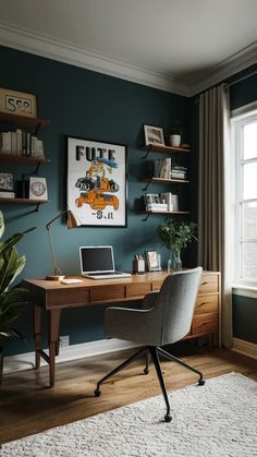 a desk with a laptop on it in front of a window