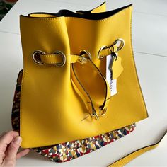 New With Tags! Fabulous Color. Attached Pouch. Two Straps: A Guitar-Style Patterned Canvas One Or A Narrow Leather One. Adjustable Closure - Close It Tight Or Open It Wide. Lined With Black Bonded Fabric. Thanks For Looking! Modern Yellow Satchel With Gold-tone Hardware, Trendy Yellow Satchel With Adjustable Strap, Modern Yellow Bags With Gold-tone Hardware, Trendy Yellow Bag With Removable Pouch, Yellow Bucket Bag With Gold-tone Hardware, Yellow Satchel Shoulder Bag With Detachable Strap, Yellow Satchel Bag With Detachable Strap, Yellow Satchel With Adjustable Strap, Yellow Crossbody Shoulder Bag With Detachable Strap