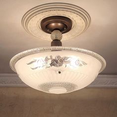 a ceiling light that is hanging from the ceiling