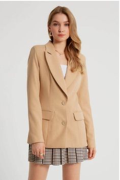 A rockstar blazer meets pure sophistication in this women's designer light camel blazer. This piece has a luxe peak lapel, functional buttoned front and generously padded shoulders that will enhance any outfit. Add this classic piece to your wardrobe revamp for next time you're dressing up for that big promotion at work or heading out on the town Product Features - Pure sophistication written all over it - Comes with luxe peak lapels and functional buttonfront - Padded shoulder adds comfort, sup Promotion At Work, Wardrobe Revamp, Camel Blazer, Big Promotion, Peak Lapel, Designing Women, Product Features, Camel, Promotion