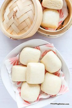 some food that is on a plate and in a bowl with chopsticks next to it