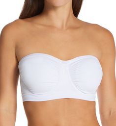 Soft strapless bra is knit for a comfortable stretch fit and easily changes shape to give you a perfect fit. Made of nylon and spandex. Seamless underwire cups are self lined with built-in pockets for removable padding, included. Cups are dual layers of 4-way stretch knit with ruching at the center and sides so that fit expands. Sweetheart neckline has a ribbed edge for flexible fit. Silicone grippers along the inner edge of the neckline (near center), keep cups from slipping. Ribbed 2-layer bas Solid Color Bandeau Sports Bra With Built-in Bra, Stretch Tube Top With Built-in Bra And Underwire, Strapless Solid Color Bra-friendly Tube Top, Strapless Solid Color Tube Top Bra Friendly, Strapless Solid Color Tube Top, Bra Friendly, Micro-elastic Seamless Strapless Tube Top, Seamless Fitted Underwire Tube Top, Seamless Solid Bandeau Bra, Micro-elastic Strapless Bra-friendly Tube Top