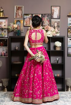 Pink signifies feminity and romance. This pink lehenga is very chic. For all the cool girls, this is the right choice. Sleeveless blouse and skirt with all-over embroidery of light floral jaal made with zari sequins. Cutdana and Resham. Beautiful pink and gold drops on the blouse hemline will steal your heart. Light yet classy pink lehenga with gold borders delivers a very sophisticated look. You have the option to change the color of the garment and make it according to your requirements. Pleas Orange Color Combinations, Haldi Outfit, Curated Outfit, Hot Pink Color, Pink Lehenga, Color Wedding, Wedding Lehenga, Raw Silk, Blouse And Skirt