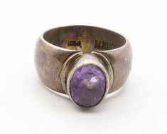 SUARTI 925 Silver - Vintage Amethyst Dark Tone Smooth Band Ring Sz 7 - RG13314  Jewelry Type:         Ring  Metal Type:            925 Silver  Metal Size:             7 Finger  Stone Type:            Amethyst   Condition:              N/A  Jewelry Weight:     10.9 Grams  PLEASE NOTE: THIS ITEM IS PRE-OWNED. ALTHOUGH MOST ITEMS ARE IN VERY GOOD CONDITION, SOME MAY NEED CLEANING AND/OR MINOR REPAIRS. WE MAKE A VERY STRONG EFFORT TO UPLOAD CLEAR PICTURES. PLEASE INSPECT ALL PICTURES AND ASK ALL QUE Ring Metal, Band Ring, Toner, Band Rings, Metallic Silver, 925 Silver, Amethyst, Size 7, Band