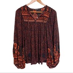 Bohemian Dream Paisley/ Floral Blouse Nwt Color: Orange And Black Model Is 5’7” And Wearing A Small Boho Bohemian Peasant Women’s Top Fall Paisley Print V-neck Blouse, Fall V-neck Blouse With Paisley Print, Fall Boho Print V-neck Tops, Casual Fall Festival Peasant Top, Black Bohemian Printed Blouse, Black Long Sleeve Top With Boho Print, Fall Peasant Style V-neck Top, Bohemian Patterned Tops For Fall, Bohemian Printed Blouse For Fall