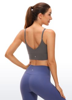 Brushed Naked Feeling collection is composed of brushed soft and four-way stretch fabric. This longline bra combines workout function and fashion. Slim strap design and V back add extra attraction for you. It is great for wearing under workout shirts as well as a tank top for low impact sports. Feature & Fitting: 
 Brushed Naked Feeling collection 
 Design for yoga or pilates 
 Low/medium support 
 Pockets for removable pads 
 Adjustable straps 
 V-back for appropriate support 
 Fabric: 
 Na Yoga Activewear With Built-in Push-up Bra, Compressive Seamless Sports Bra With Built-in Bra, Push-up Bra Friendly Activewear For Yoga, Push-up Activewear With Built-in Bra For Sports, Gray Compression Activewear With Built-in Bra, Gray Sports Bra With Built-in Bra For Pilates, Push-up Activewear With Built-in Bra For Yoga, Functional Activewear With Built-in Bra And Seamless Fabric, Seamless Push-up Activewear For Yoga