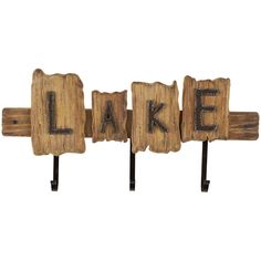 three pieces of wood with the word lake written on them