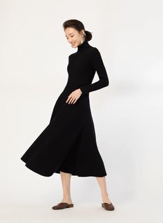 Embrace elegance with a touch of comfort in our Ribbed Turtleneck Midi Sweater Dress, perfect for making a subtle statement.
Crafted from a soft blend of polyester, viscose, and nylon, this dress balances warmth and a gentle stretch. The sleek ribbed knit accentuates your figure, while the high collar and long sleeves offer sophistication and cozy coverage. Maximizing comfort, the flexible ribbed fabric and midi-length, flared skirt move with you, showcasing its uncomplicated yet refined style.
A versatile companion, this sweater dress transitions smoothly from office hours to evening outings. Pair it seamlessly with boots for a powerful day look or add heels and accessories to transform it for a night out. The dress's simplicity is its strength, making a dignified impression in every sett Midi Sweater Dress, Simplicity Dress, Knitwear Dress, Refined Style, Ribbed Turtleneck, Sweater Dress Midi, Women Hoodies Sweatshirts, Flared Skirt, Ribbed Fabric