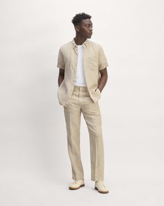 Classic Tapered Leg Flax Bottoms, Classic Tapered Leg Bottoms In Flax Color, Classic Linen Bottoms With Straight Hem, Business Casual Linen Bottoms With Relaxed Fit, Straight Leg Linen Pants With Side Pockets, Linen Relaxed Fit Bottoms For Business Casual, Relaxed Fit Straight Pants For Summer, Linen Bottoms For Business Casual With Straight Hem, Relaxed Fit Linen Bottoms For Business Casual