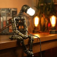 Iron Robot Lamp - Breck and Fox Steampunk Desk, Steampunk Table, Robot Lamp, Pipe Desk, Vintage Loft, Vintage Robots, Industrial Desk Lamp, Industrial Style Lighting, Retro Industrial