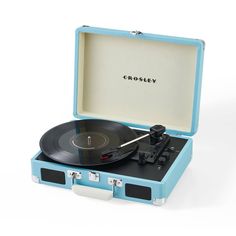 an old fashioned record player in a blue case