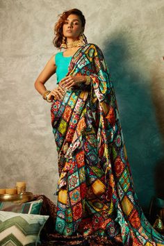 Multi color saree in modal satin base with all over tile prints.
Component: 1
Pattern: Printed
Type Of Work: Tile
Fabric: Modal satin
Color: Multi color
Other Details: 
Tile prints
Note: The blouse and belt worn by the model is not for sale
Occasion: Party - Aza Fashions Round Neck Sleeveless Blouse, Multi Color Tile, Green Sleeveless Blouse, Printed Tile, Ruffle Saree, Saree For Women, Print Saree, Tile Print, Printed Saree