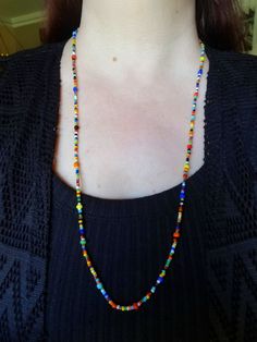 This beautiful hand-beaded necklace is made from glass and resin seed beads. It has a 14 inch hang and is 28 inches round. Such amazing detail in the beadwork, all completely handmade, just for you! I bead daily, and make each necklace to order. The necklace is a slightly Boho yet Tribal; It is lightweight, and a joy to wear! Handmade and assembled into this masterpiece. Looks great for dressing up, or with jeans dressing down. It always gets a comment. Simple, elegant, yet a big statement. You' Spiritual Style Faceted Round Beaded Necklaces, Spiritual Style Round Faceted Beads Necklace, Bohemian Czech Glass Tiny Beads, Bohemian Czech Glass Oval Beads, Bohemian Oval Czech Glass Beads, Spiritual Beaded Necklaces With Faceted Oval Beads, Spiritual Beaded Necklace With Faceted Oval Beads, Czech Glass Beaded Necklaces For Festivals, Bohemian Czech Glass Beaded Necklace With Tiny Beads