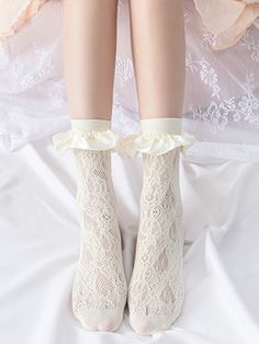 These socks feature an intricate hollow-out design complemented by delicate ruffled lace trim. Elegant and versatile, they effortlessly elevate any outfit.  The price includes one pair of socks. Summer Lace Socks With Lace Trim, White Lace Trim Socks For Summer, Summer White Socks With Lace Trim, White Stretch Socks With Ruffles, Stretch White Socks With Ruffles, Elegant Spring Stockings With Lace Trim, Elegant Lace Trim Stockings For Spring, Elegant Lace Stockings For Spring, Steampunk Fashion Male