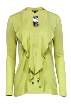 This Lafayette 148 cardigan is the perfect pick-me-up for your wardrobe! Its fun chartreuse hue and playful ruffled collar will instantly add a pop of color and cozy-cute vibes to any ensemble. With a tie-front closure, it's the ideal layer piece to take your look from basic to bold! Size S 51% Cotton, 49% Viscose Tie front Ruffled collar Bust 32.5" Waist 28" Shoulder to hem 26.5" Sleeve length 24.5" Chic Spring Solid Color Cardigan, Chic Summer Sweater With Ruffles, Spring Green Cardigan For Layering, Long Sleeve Summer Outerwear With Ruffles, Green Cardigan For Spring Layering, Summer Long Sleeve Ruffled Outerwear, Green Spring Cardigan For Layering, Spring Trendy Ruffled Cardigan, Trendy Ruffled Spring Cardigan