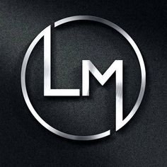 the letter lm in a silver circle on a black background stock photo - budget conscious