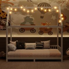 a child's bedroom with a canopy bed and lights on the wall above it