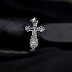 This elegant and meaningful men's pendant features a finely crafted crucifix design in gleaming sterling silver. The pendant showcases a traditional Christian cross with meticulous attention to detail, including a raised figure of Jesus Christ. The silver has a polished finish that adds to its overall luster and sophistication.   The crucifix pendant is designed with a masculine touch, making it a perfect accessory for men of faith who want to wear a symbol of their beliefs with style and grace. The pendant is sized to be noticeable yet not overpowering, making it suitable for both everyday wear and special occasions. * Product Details * * Material: High Quality Solid 925 Sterling Silver. * Finish : Gold, Silver, Oxidized. Gold : 14K Gold Plated Sterling Silver. Silver : 14K White Gold Pla Sterling Silver Cross For Anniversary, Sterling Silver Cross Charms For Anniversary, Sterling Silver Cross Jewelry For Anniversary, Classic Sterling Silver Cross Charm, Silver Crucifix Cross Necklace For Anniversary, Spiritual Polished Cross Jewelry And Charms, Classic Engraved Crucifix Cross Necklace, Silver Crucifix Necklace With Polished Finish, Spiritual Hallmarked Crucifix Jewelry And Charms