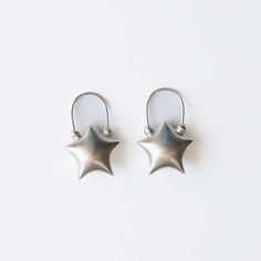 The Star Earrings, had designed and created by us. We have spent hours perfecting the shape. An ode to the origami puff star. Easy and lightweight to wear The Shape, Hand Designs, Star Earrings, The Star, 1 Inch, Origami, Handmade Items, Created By, Stud Earrings