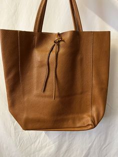 NEW High Class  Dark Tan (Brown) Women's Genuine Leather Bag, Leather Tote Bag, Gift Bag, Shoulder Bag Tried to show right colour in photos Approximate dimension size: L(TOP):41CM L(BOTTOM):28CM H:37CM W:13CM, The Handle approximately: 29 cm, Inner Pocket approximately: Length:16cm; Height:16cm At £60 Please add me to your favourite seller list Please check my shop which consist of the different fabrics such as wool, silk, jacquard, fabulous, exquisite fabrics, scarves and bags Will NOT take res Dark Tan Leather Bag For On-the-go, Brown Bag With Large Capacity For On-the-go, Cognac Textured Leather Bag For On-the-go, Brown Satchel Shoulder Bag For Daily Use, Brown Satchel Bag For Daily Use, Brown Bag With Adjustable Strap For Daily Use, Brown Double Handle Shoulder Bag For Everyday, Brown Satchel Shoulder Bag With Removable Pouch, Brown Crossbody Bag For Daily Use