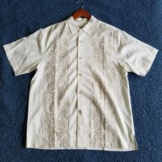 White Tommy Bahama Silk Shirt With Tropical Floral Embroidery In Taupe Colored Thread. 100% Silk Approximate Measurements: Chest - 22 Inches Across/44 Inches Around Length - 27 1/2 Inches From Shoulder To Hem Condition: New W/Tags Jacquard Shirt, Shirt Cuff, White Button Down Shirt, Men's Button Down Shirt, Silk Shorts, Long Sleeve Plaid, Short Sleeve Button Up, Tropical Floral, Check Shirt