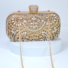 New to our Millennium collection, This beautiful romantic Silver Gold Crystal Floral Leaves bridal clutch bag is made of very fine quality of crystal,  rhinestones, fabric and metal and it comes with Chain 46 inches long os cross body bag Detachable chain for your Big day! The Clutch measure about 7.5 inches long, 4 inches wide and thickness of the bag is 1.8 inches  ► ABOUT YOUR ORDER * All items are neatly packaged in our beautiful jewelry boxes and elegant organza bags. * All items are 100% gift-ready. * Each order comes with a personalized handwritten card and a branded Millennium Bride jewelry cloth. * Each order comes with a free gift. ► PERSONALIZTION * If your order is a gift, you may contact us with the recipient's name or a message, and we'll print a personalized card that will b Gold Clutch Bag For Evening, Gold Rectangular Shoulder Bag For Formal Occasions, Gold Rectangular Formal Shoulder Bag, Gold Formal Rectangular Shoulder Bag, Luxury Openable Clutch For Wedding, Gold Clutch Openable For Party, Rectangular Clutch For Wedding, Gold Pouch Bag For Evening, Elegant Wedding Shoulder Bag With Openable Feature