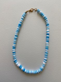 Blue necklace inspired by the ocean Blue Single Strand Long Beaded Necklace, Blue Long Single Strand Beaded Necklace, Blue Beaded Beachy Jewelry, Ocean-inspired Blue Beaded Necklace With Colorful Beads, Ocean-inspired Blue Beaded Necklace, Blue Long Necklace Suitable As A Gift, Ocean-inspired Blue Beaded Necklaces With Round Beads, Blue Strand Necklace With Beachy Style, Ocean-inspired Blue Jewelry With Colorful Beads