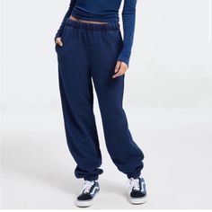 Good American Jeanius Jogger Sweatpants Indigo Size Medium Or Size 2 New With Tags Casual Relaxed Fit Indigo Bottoms, Casual Indigo Relaxed Fit Bottoms, Sporty High Rise Bottoms With Pockets, Casually Fitted Indigo Pants, Casual Indigo Pants With Loosely Fitted Hips, High Rise Athleisure Bottoms With Elastic Waistband, Casual Straight Leg Indigo Bottoms, Casual Indigo Straight Leg Bottoms, Indigo High Waist Bottoms With Pockets