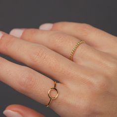 "This dainty beaded classic is a goes-with-everything sort of ring. A simple, tiny, elegant stacker with a whole lot of shine, this is the perfect addition to your everyday ring stack. *Price is per ONE ring as seen in the second photo. Other rings are available to purchase separately from my shop. * D E T A I L S * ∙ Material: 18K Gold Plated over .925 Sterling Silver ∙ Dimensions: Band thickness: 1.3mm ∙ Hypoallergenic & nickel-free * P A C K A G I N G * ∙ All jewelry is sent out beautifully p Minimalist Silver Ring, Jewelry Hacks, Dainty Gold Ring, Dainty Gold Rings, Everyday Ring, Gold Ring Designs, Ring Stack, Everyday Rings, Eye Earrings