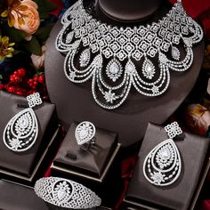 CZ Jewelry-Luxury Trendy Flower Blossom Nigerian Jewelry sets For Women Wedding Cubic Zircon CZ Chokers Dubai Gold Bridal Jewelry SetModel Number:1005002619297285 Pakcage list1 pair earring ;1pc necklace,1 Pc bangle,1 pc ringMaterial: 18K Gold/White Gold Plated +100% AAA Cubic Zirconia DiamondWearing Occasion: Daliy Wear / Party / Anniversary / WeddingGift for: Girl friend / Wife / Mom / YourselfThis jewelry accord with the eu environmental requirements100% 18K Gold/White Gold Plated Wedding Jewelry Set For Women AAA CZ Imitation Diamond Engagement Jewelry Set Nigerian Jewelry, Gold Bridal Jewelry, Blossom Jewelry, Princess Jewelry, Big Necklace, Gold Bridal Jewellery Sets, Bridal Jewelry Set, Copper Style, Trendy Flowers