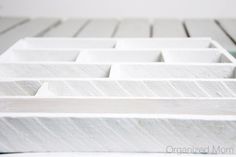 a close up view of white marble blocks with lines on them in the shape of squares and rectangles