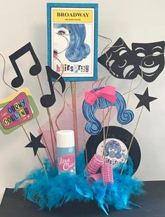 this is an image of a birthday centerpiece with musical notes and hairbrushes