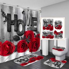 a bathroom with red roses on the shower curtain, rugs and bath mats in front of it