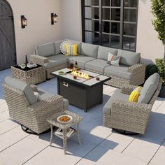 an outdoor living room with grey wicker furniture and yellow pillows on the couches