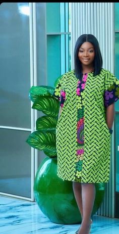 Lovely multi patterned ankara dress,ready to ship.Fits women sizes small and medium.Neatly made dress,exactly as seen in picture. Fitted Green Maxi Dress With Patchwork, Green Maxi Dress With Vibrant Print And Short Sleeves, Casual Multicolor Ankara Fabric Dress, Casual Multicolor Ankara Dresses, Green Batik Print Short Sleeve Dress, Green Short Sleeve Batik Print Dress, Green Cotton Dress With Vibrant Print, Dress African Print, Italian Dress