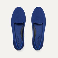 The Lounge Loafer in Cosmic Blue Knit upper in royal blue, with a Venetian vamp and rounded toe box. Features our In Love Insole™ in blue for heel-to-toe cushioning for all-day wearability. Tonal topline piping in blue adds a touch of elegance. Charcoal sculpted outsoles provide added comfort and stability. Blue Slip-on Loafers With Flat Heel, Blue Slip-on Loafers With Rubber Sole, Blue Closed Toe Loafers With Rubber Sole, Blue Slip-on Shoes With Round Toe, Blue Slip-ons With Round Toe, Blue Slip-ons With Textured Sole, Comfortable Blue Loafers With Rubber Sole, Comfortable Blue Loafers With Round Toe, Blue Slip-ons With Textured Sole And Round Toe