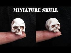 there are two pictures of a miniature skull on someone's finger, one is white and the other is black