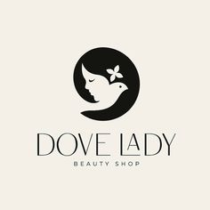 the logo for dove lady beauty shop, with a woman's face and flowers in her hair