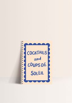 a spiral notebook with the words cocktails and cups de solei written on it