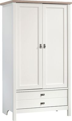 a white armoire with two doors and drawers on the bottom shelf is against a white background