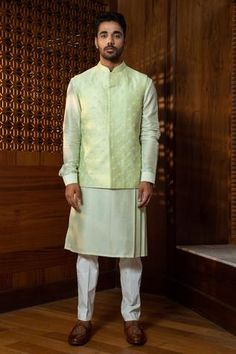 Shop for Darshika Menswear Green Silk Chanderi Bundi Kurta Set for Men Online at Aza Fashions Green Chanderi Bandhgala With Zari Work, Green Chanderi Bandhgala With Cutdana, Transitional Green Chanderi Bandhgala, Green Chanderi Bandhgala For Transitional Season, Green Chanderi Bandhgala With Traditional Drape, Green Chanderi Bandhgala For Festivals, Fitted Green Chanderi Bandhgala, Fitted Green Bandhgala In Chanderi, Festival Green Chanderi Bandhgala