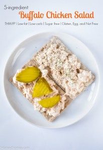 a white plate topped with food on top of a table