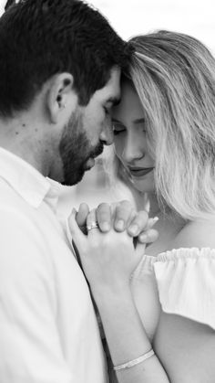 black and white photo of a couple holding each other