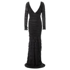 Gucci by Tom Ford black silk ruched evening dress with tired skirt, ss 2003 | See more vintage Evening Dresses and Gowns at https://www.1stdibs.com/fashion/clothing/evening-dresses in 1stDibs Tired Skirt, Gucci By Tom Ford, Ford Black, Floor Length Skirt, Ruched Bodice, Black Silk, Tom Ford, Creative Director, Evening Dress